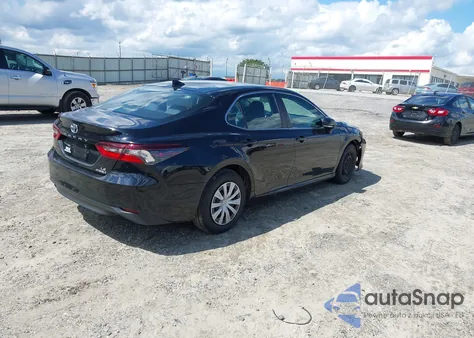 2021 Toyota Camry Le Hybrid z USA, uszkodzony, nr VIN 4T1C31AK3MU554394
